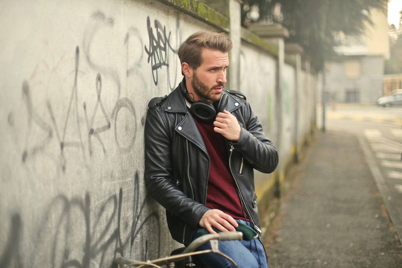 man wearing leather jacket